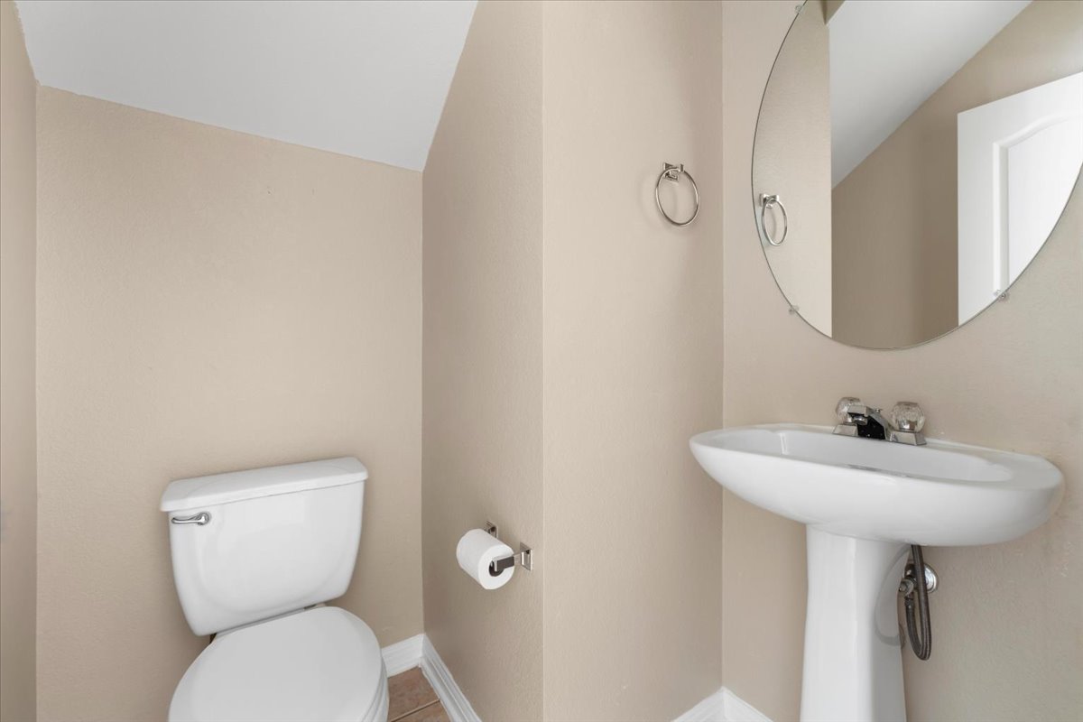 11000 Anderson Mill Road, Unit 11 Austin, TX 78750 - Photo 21 of 34 A well-maintained powder room offering functional design and a clean aesthetic.