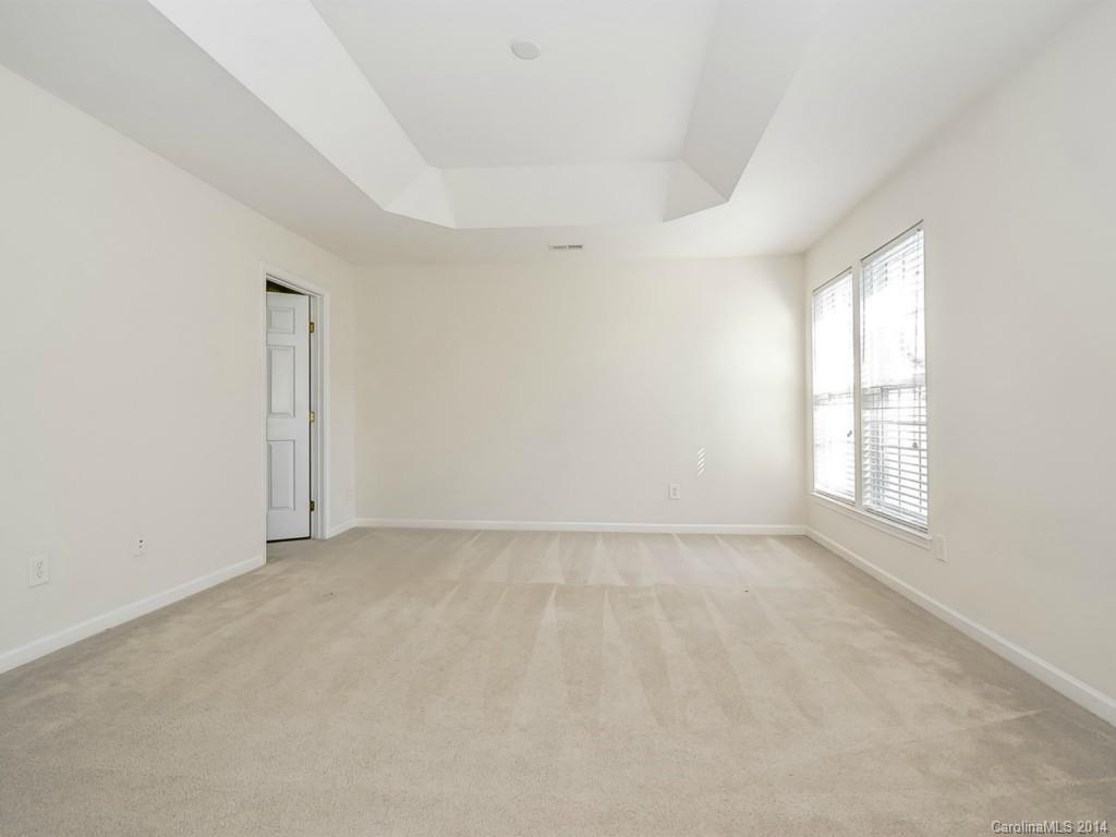 173 Snead Road, Unit 173 Fort Mill, SC 29715 - Photo 14 of 24 an empty room with windows