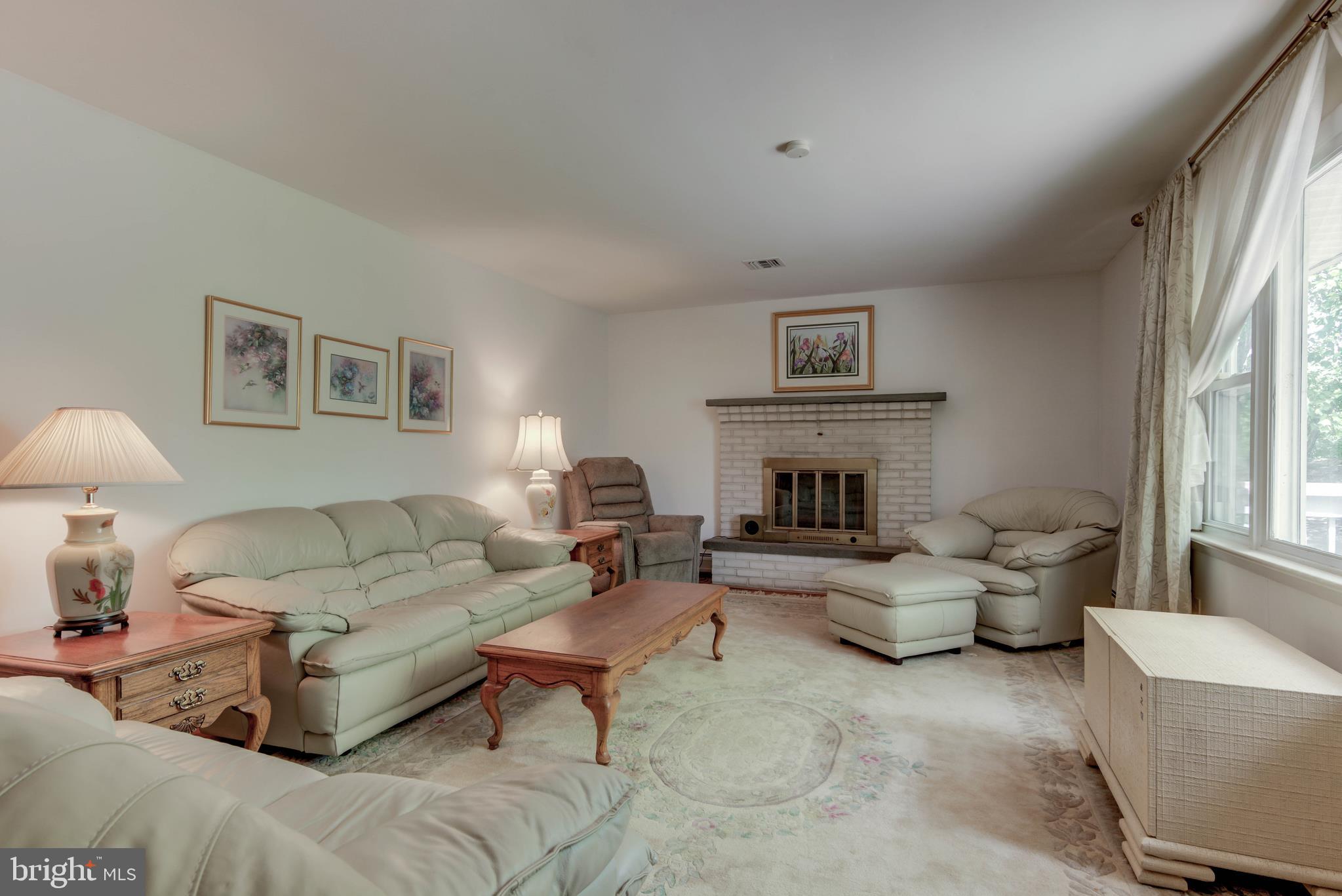 381 Pusey Mill Road Cochranville, PA 19330 - Photo 10 of 28 Living Room with fireplace