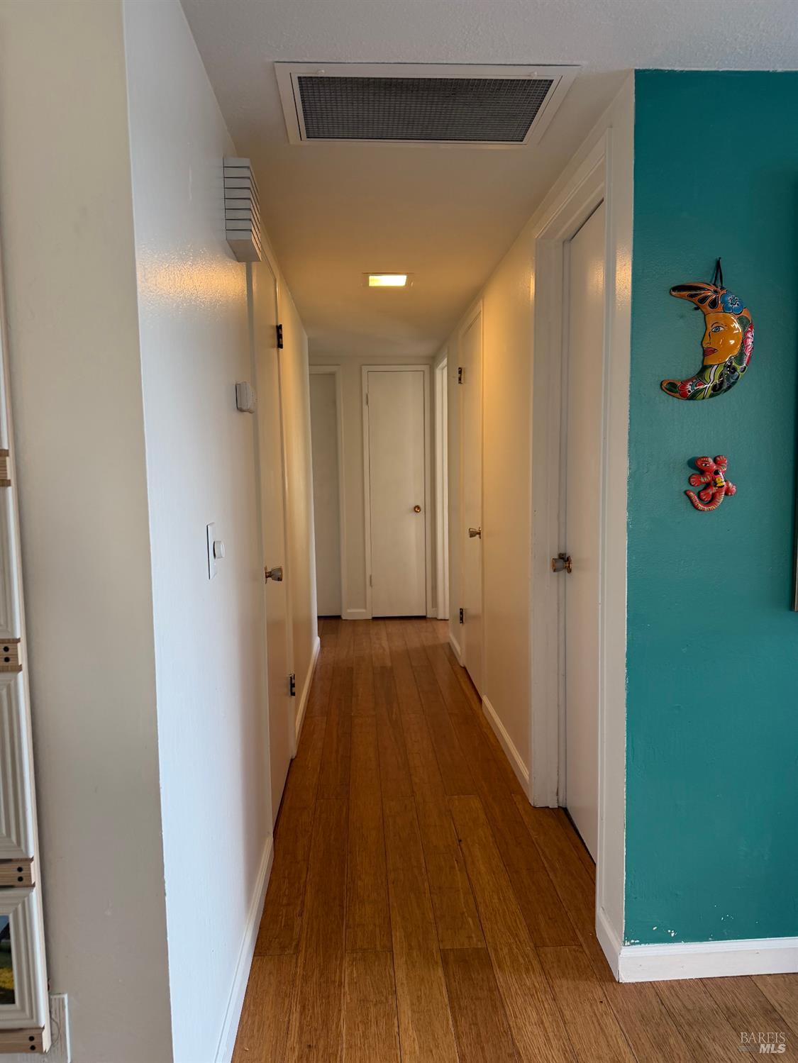 611 Willrush Street Santa Rosa, CA 95401 - Photo 14 of 19 a view of hallway with wooden floor