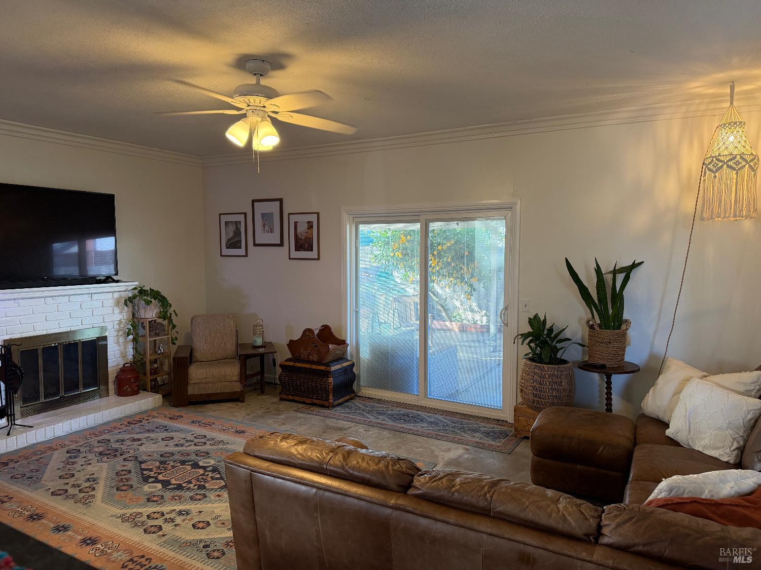 611 Willrush Street Santa Rosa, CA 95401 - Photo 6 of 19 a living room with furniture and a fireplace