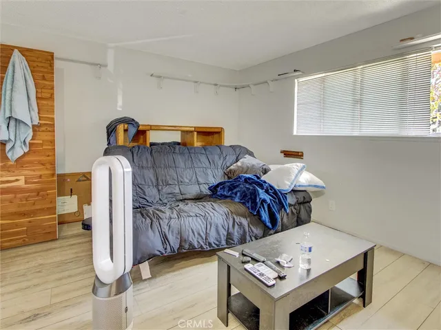 a view of livingroom with furniture and wooden floor