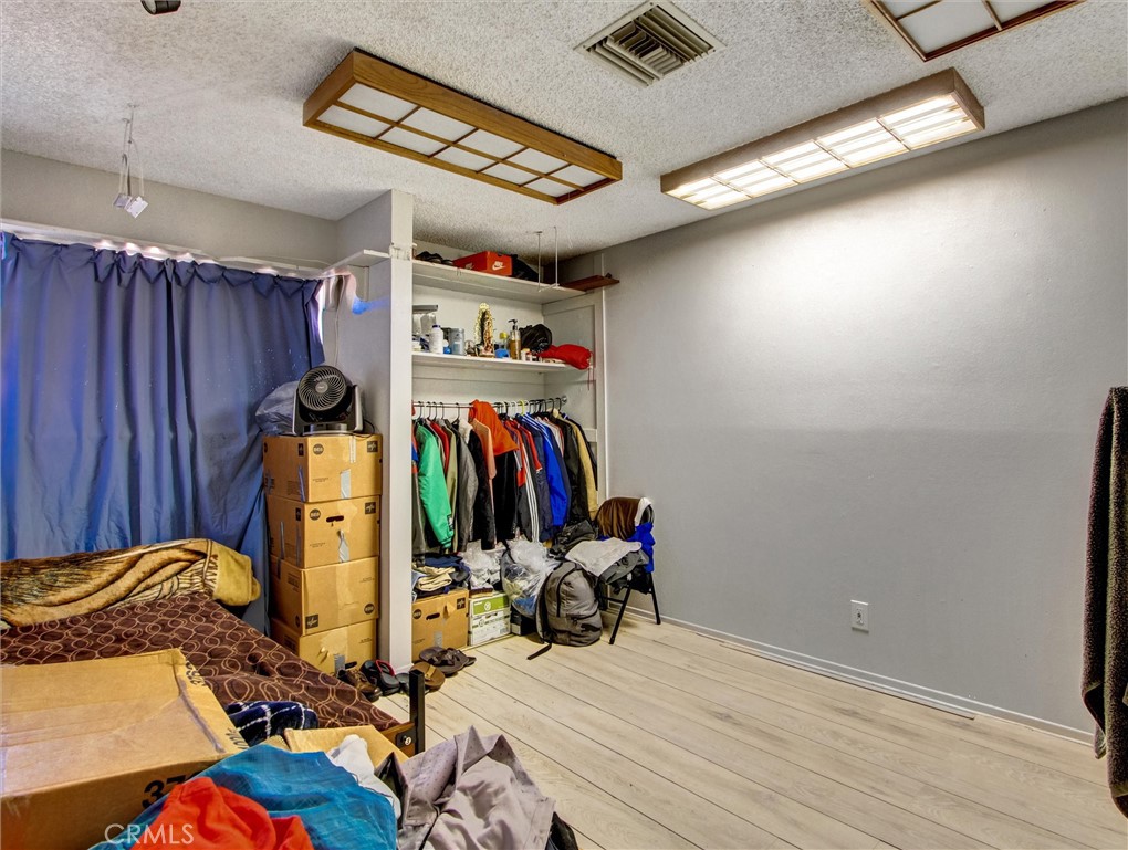 10552 Royal Oak Way Stanton, CA 90680 - Photo 17 of 21 a view of a room with gym equipment