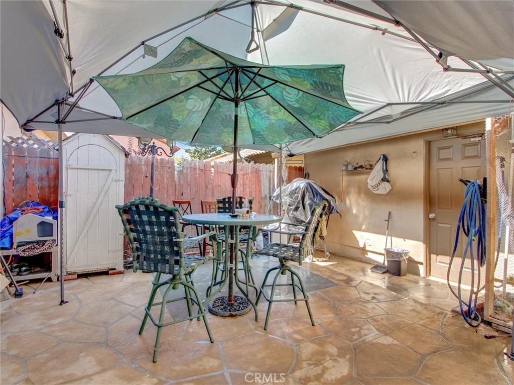 10552 Royal Oak Way Stanton, CA 90680 - Photo 19 of 21 a view of an outdoor space with a patio and a chair