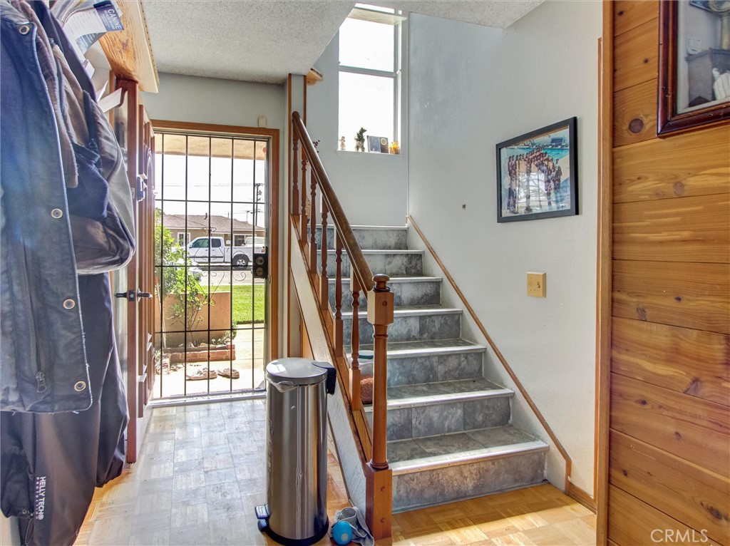 10552 Royal Oak Way Stanton, CA 90680 - Photo 5 of 21 a view of entryway with wooden floor and a front door