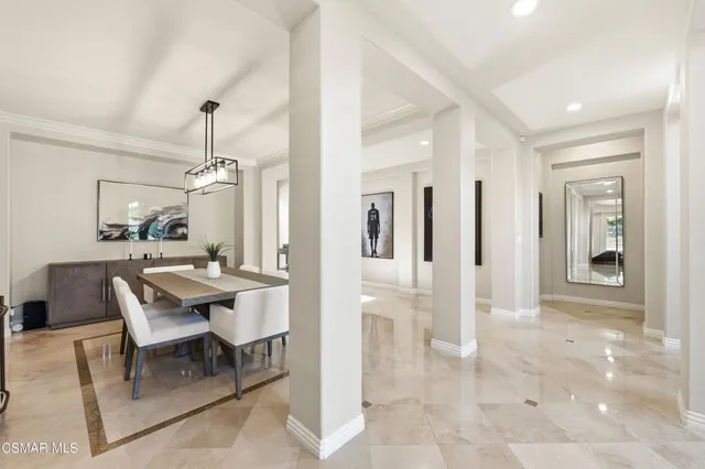 a view of a livingroom with furniture and a table