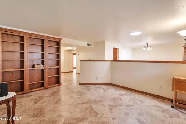 a view of a house with a yard and garage