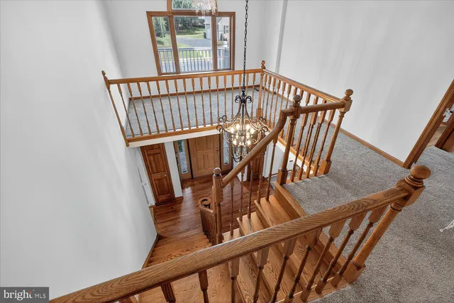 a view of hallway with furniture