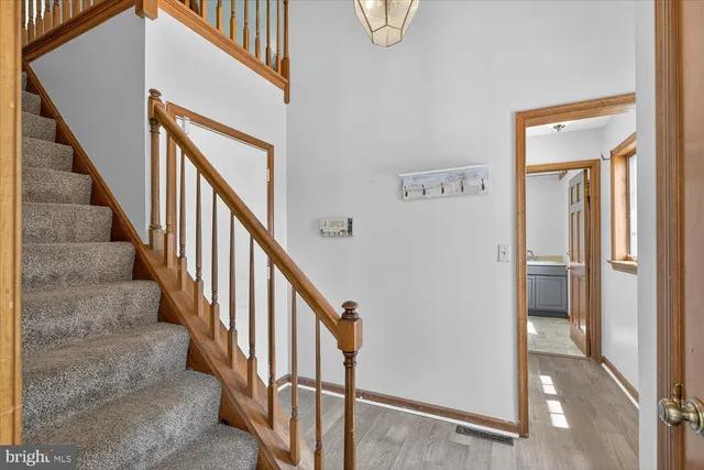 a view of a house with sitting area and furniture
