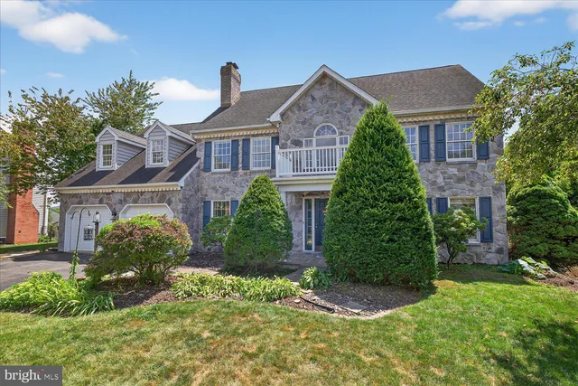 an aerial view of a city with lots of residential buildings