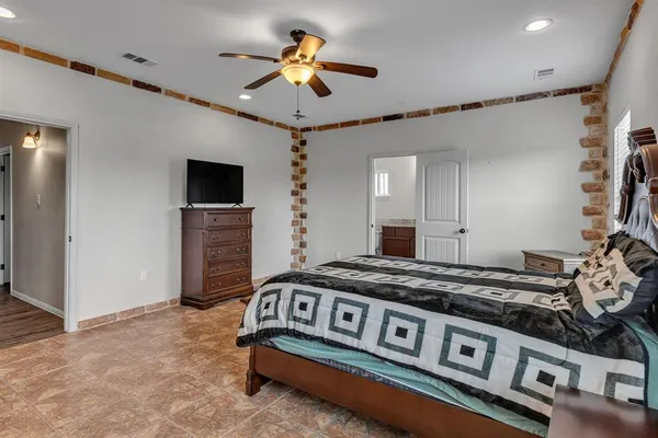 a kitchen with stainless steel appliances granite countertop a stove and a refrigerator