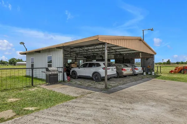 a view of a car in front of house
