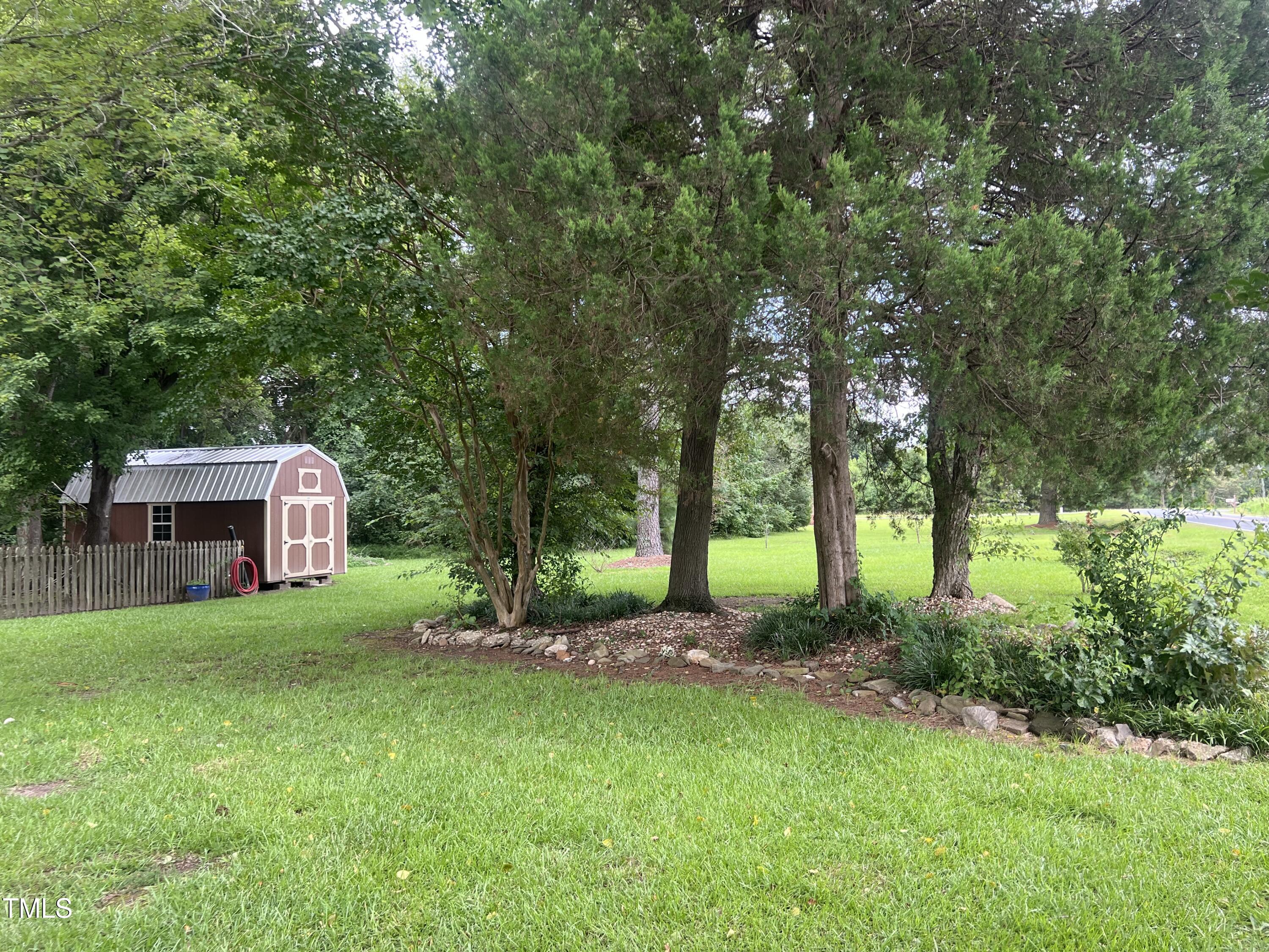 1413 Bud Hawkins Road Dunn, NC 28334 - Photo 40 of 51 adjacent lot to convey with outbuilding.,,