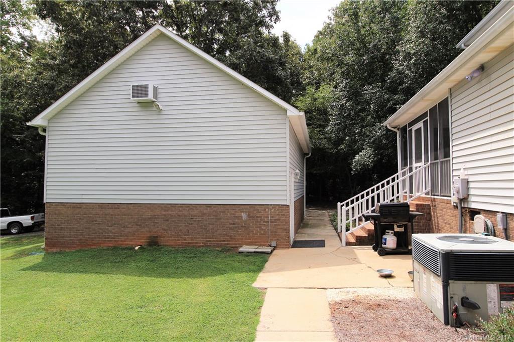 827 Brian Road, Unit 5 Clover, SC 29710 - Photo 20 of 21 a view of a house with a backyard