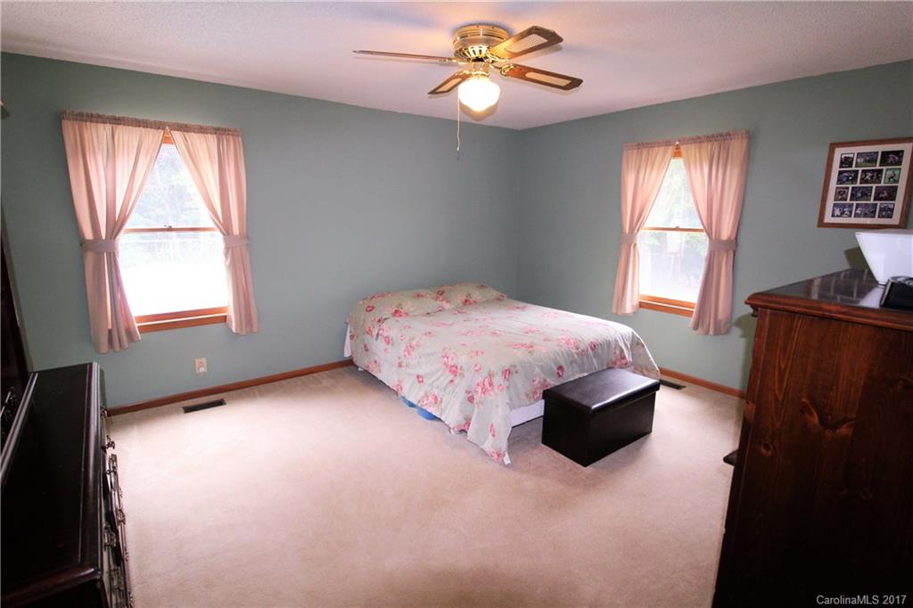 827 Brian Road, Unit 5 Clover, SC 29710 - Photo 7 of 21 a bedroom with a bed dresser and a window