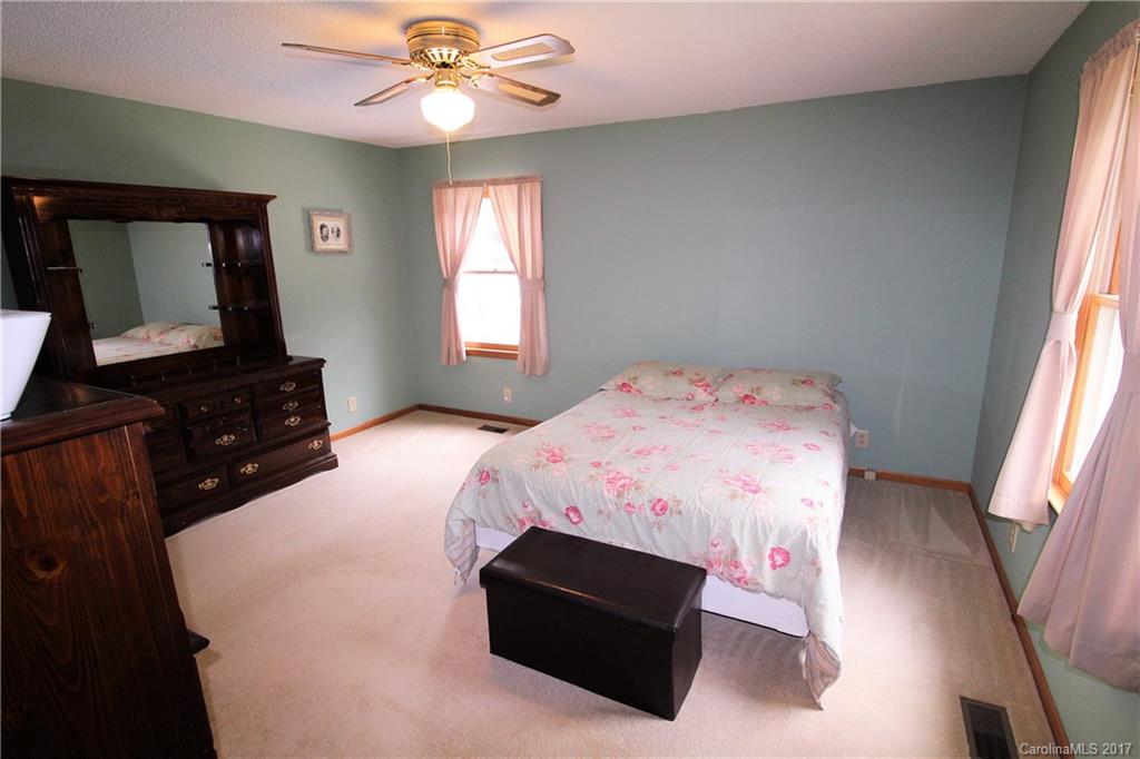 827 Brian Road, Unit 5 Clover, SC 29710 - Photo 8 of 21 a bedroom with a bed window and dresser