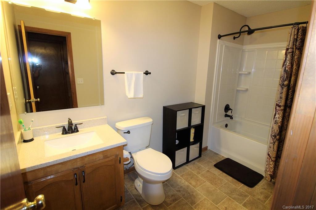 827 Brian Road, Unit 5 Clover, SC 29710 - Photo 9 of 21 a bathroom with a sink a toilet and shower