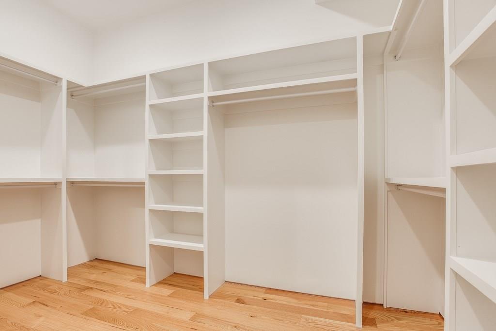 5801 Bryan Parkway Dallas, TX 75206 - Photo 11 of 16 a view of an empty room with wooden floor and closet