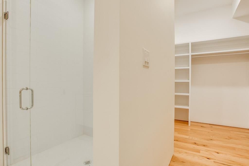 5801 Bryan Parkway Dallas, TX 75206 - Photo 12 of 16 a view of a room with wooden floor and white wall
