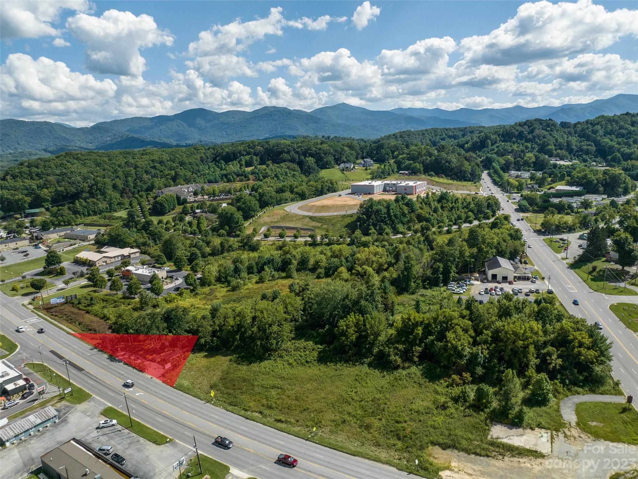 1207 Dellwood Road Waynesville, NC 28786 - Photo 4 of 4 a view of a city and mountain view