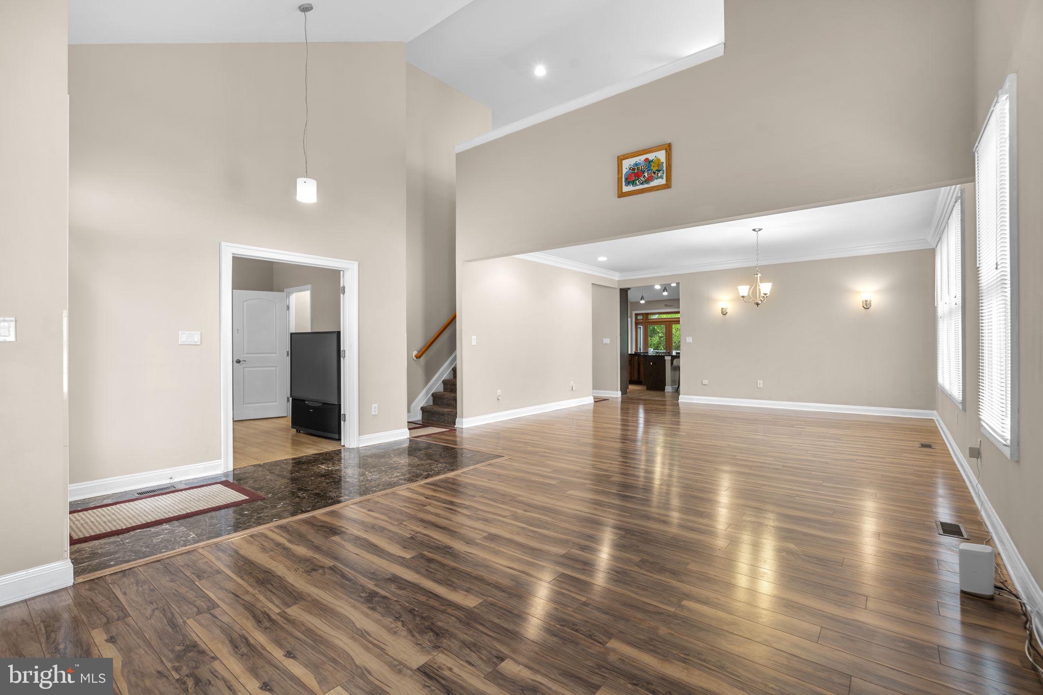 8024 Solley Road Glen Burnie, MD 21060 - Photo 32 of 83 a view of a hallway with wooden floor