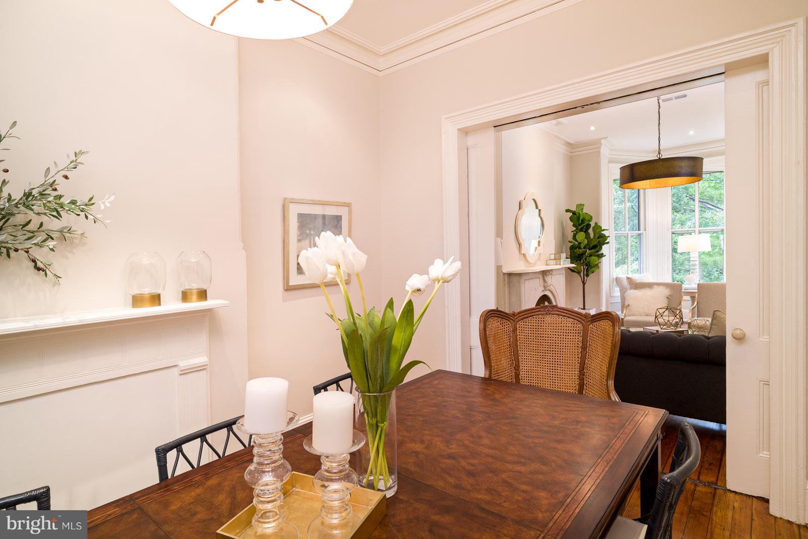 1833 12th Street Northwest Washington, DC 20009 - Photo 11 of 30 a living room with furniture potted plant and a window