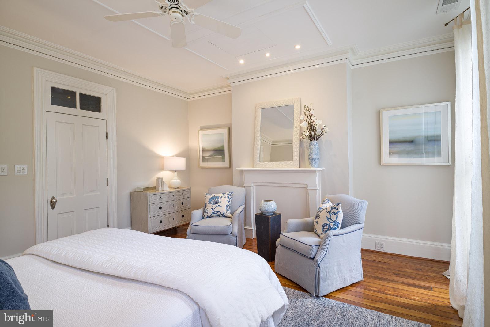 1833 12th Street Northwest Washington, DC 20009 - Photo 16 of 30 a bedroom with a bed and wooden floor