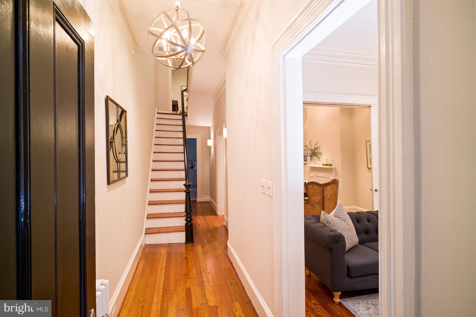 1833 12th Street Northwest Washington, DC 20009 - Photo 3 of 30 a view of hallway with stairs and wooden floor