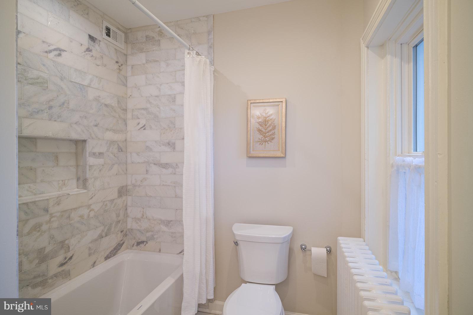 1833 12th Street Northwest Washington, DC 20009 - Photo 23 of 30 a bathroom with a toilet and a shower