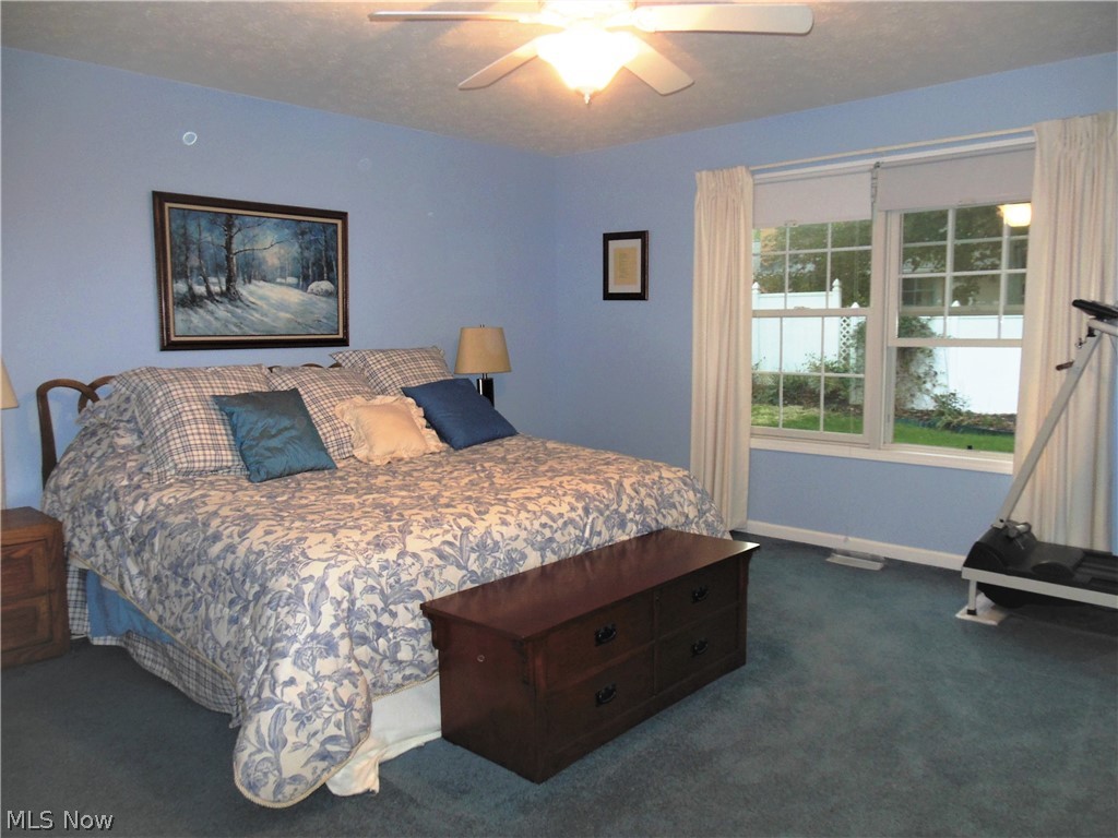 1662 Trinity Road Madison, OH 44057 - Photo 13 of 17 Master Bedroom with Master Bath & Walk-in Closet