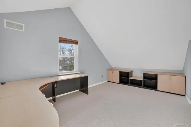a kitchen with stainless steel appliances a refrigerator and cabinets
