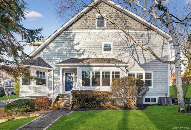 a view of a swimming pool with a lounge chair