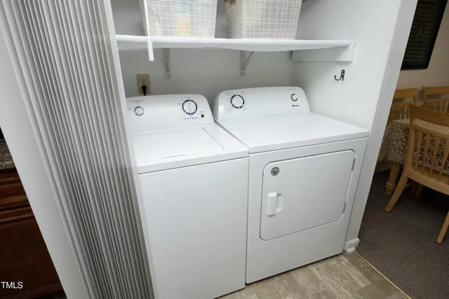 a kitchen with a stove and cabinets