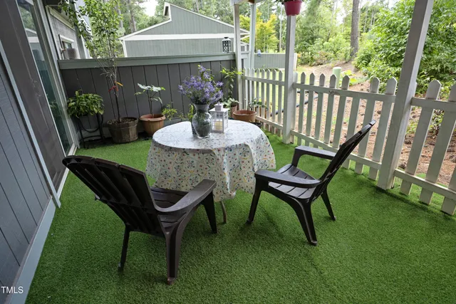 a bedroom with bed and a window