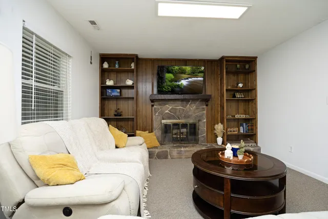 a view of a hallway with stairs