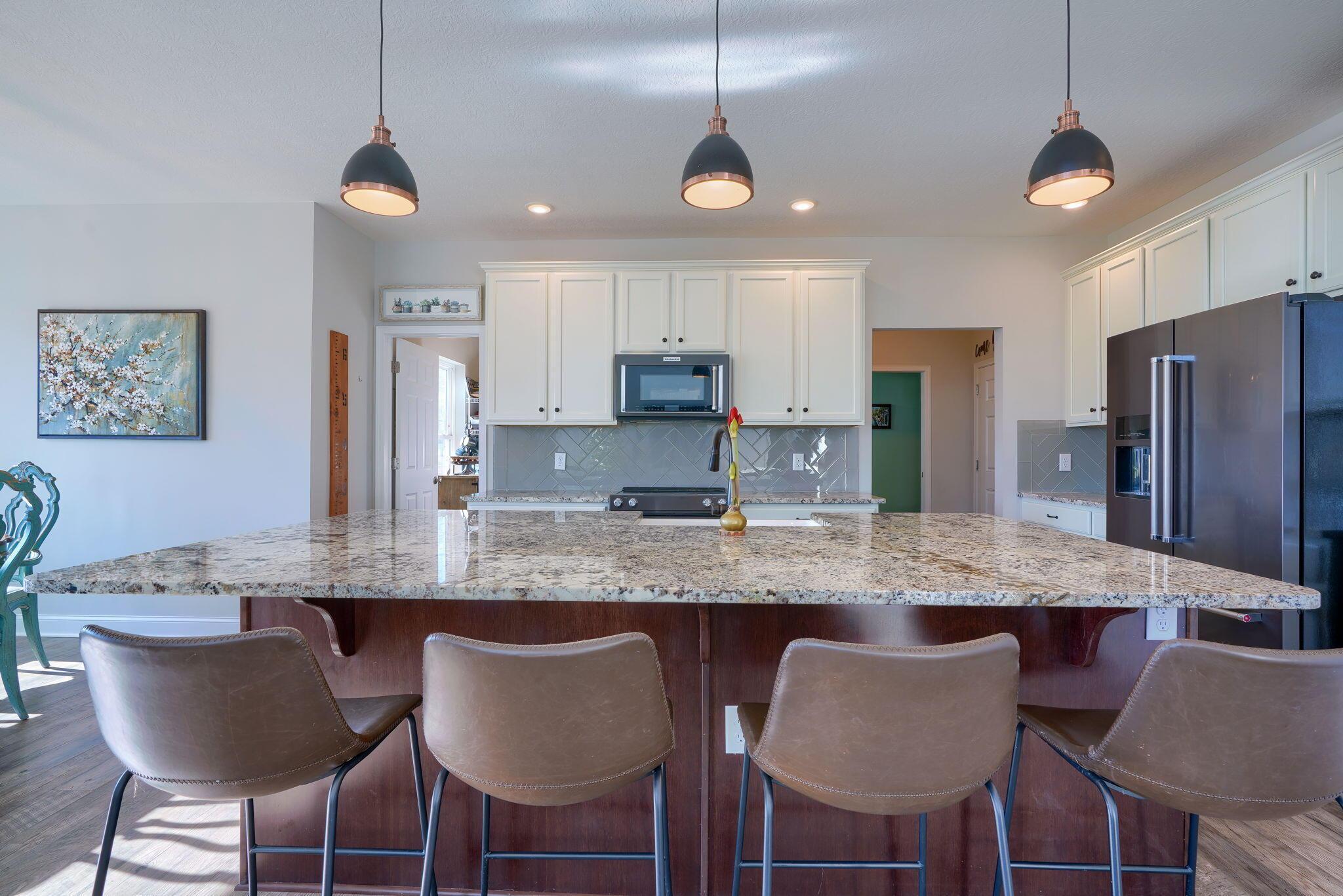 8050 Kilbourne Road Sunbury, OH 43074 - Photo 21 of 56 Recessed and Pendant Lighting