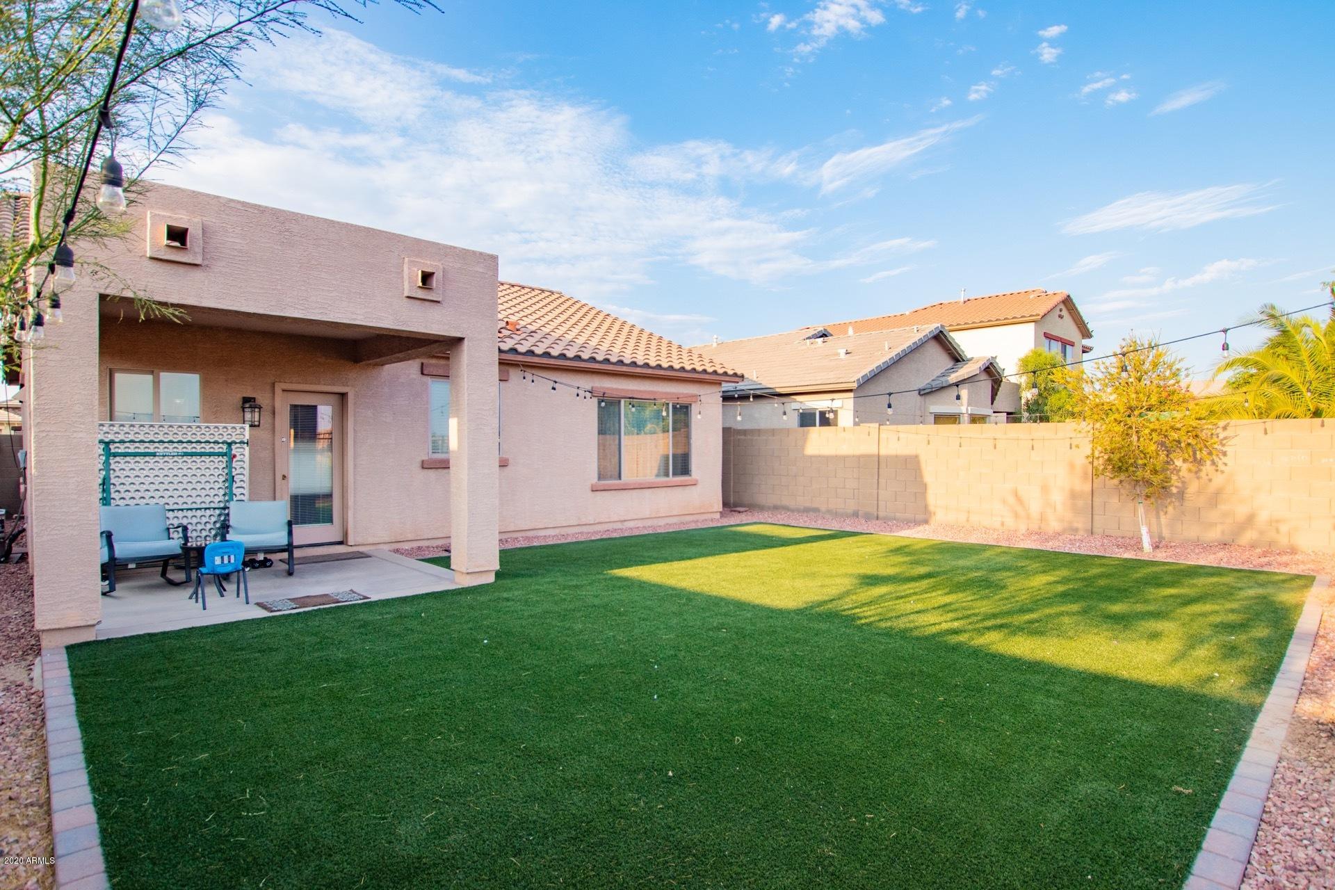 9151 West Berkeley Road Phoenix, AZ 85037 - Photo 24 of 25 Backyard with Artificial Grass