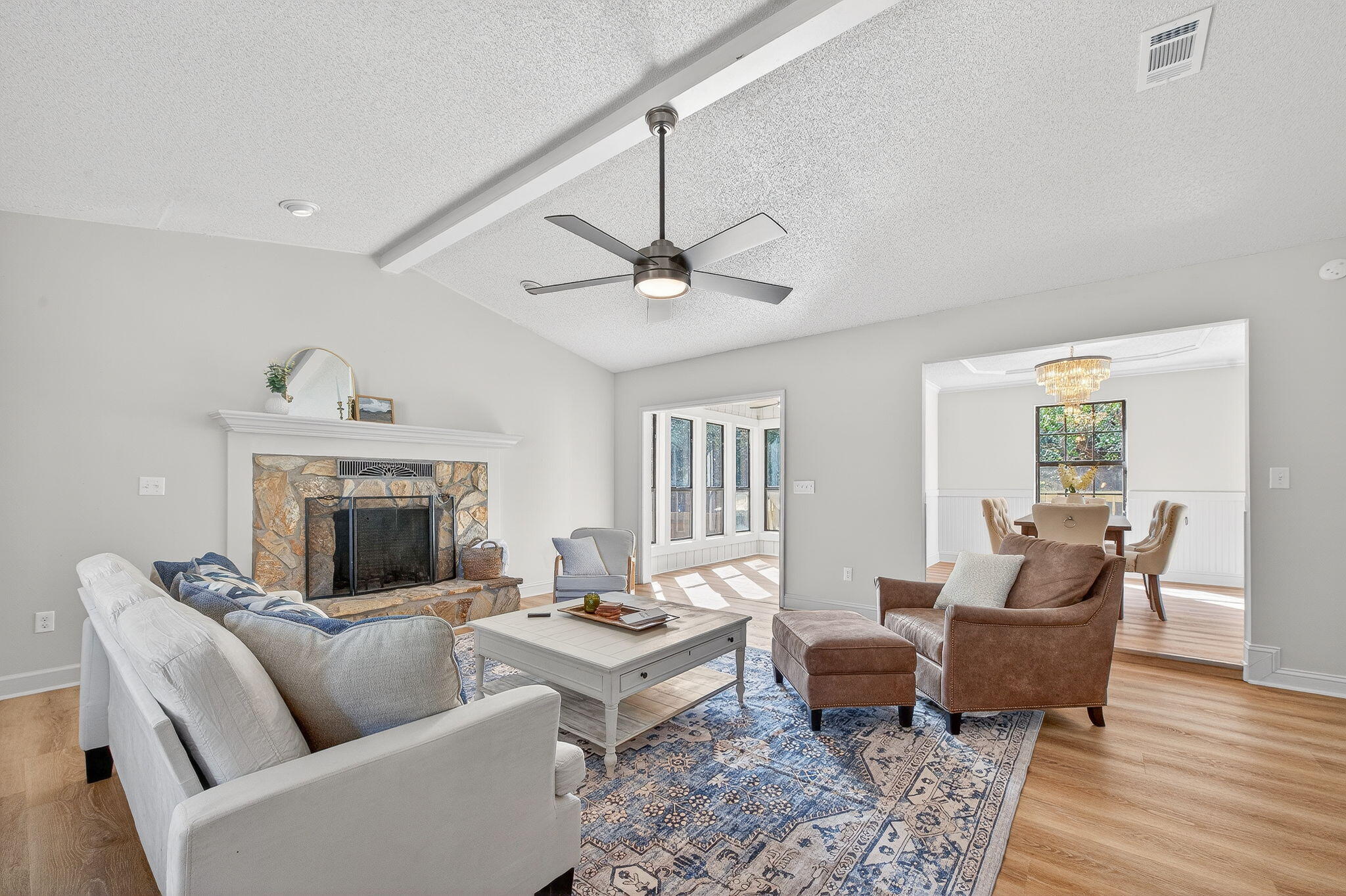 932 Ridgewood Way Niceville, FL 32578 - Photo 11 of 47 a living room with furniture and a fireplace
