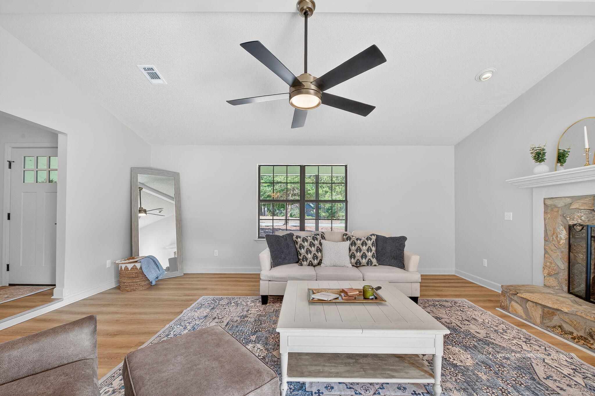 932 Ridgewood Way Niceville, FL 32578 - Photo 14 of 47 a living room with furniture and a fireplace