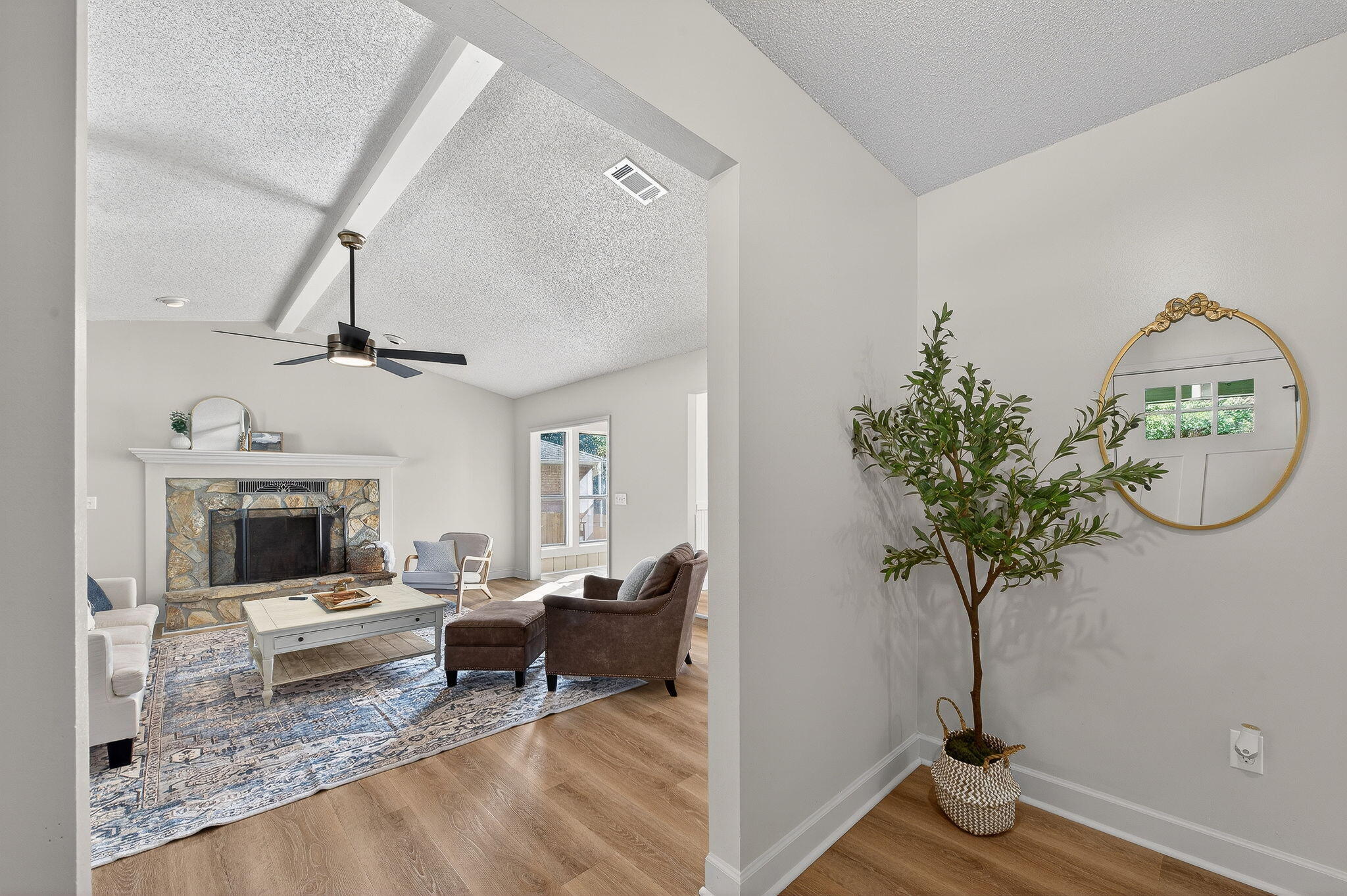 932 Ridgewood Way Niceville, FL 32578 - Photo 18 of 47 a living room with furniture and a potted plant