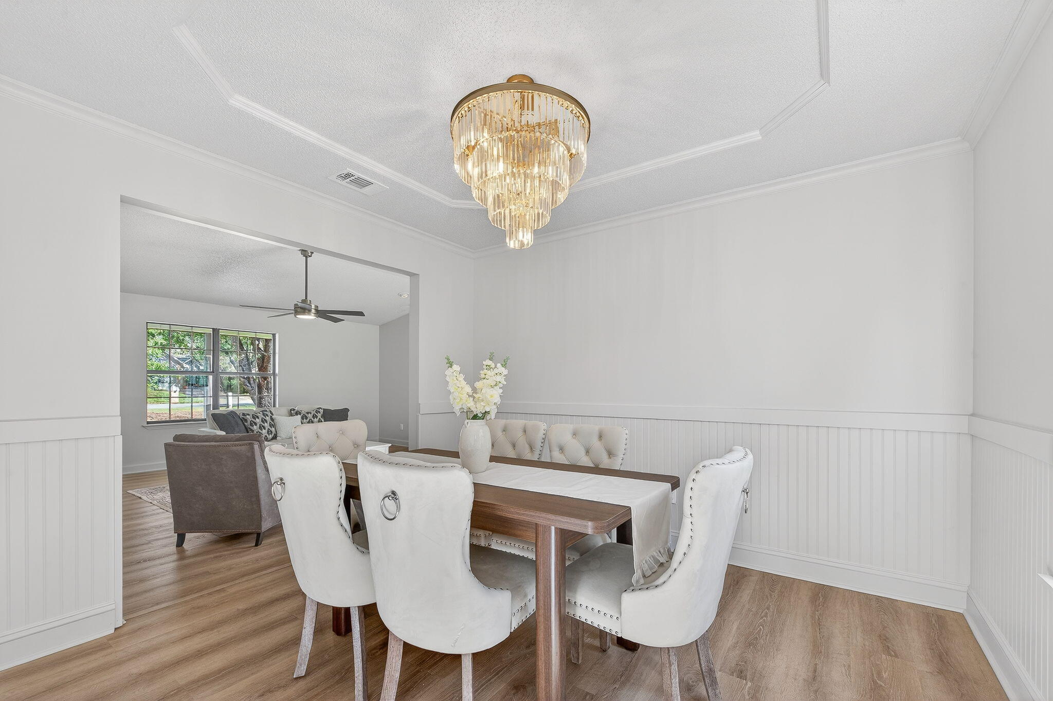 932 Ridgewood Way Niceville, FL 32578 - Photo 24 of 47 a view of a dining room with furniture and wooden floor