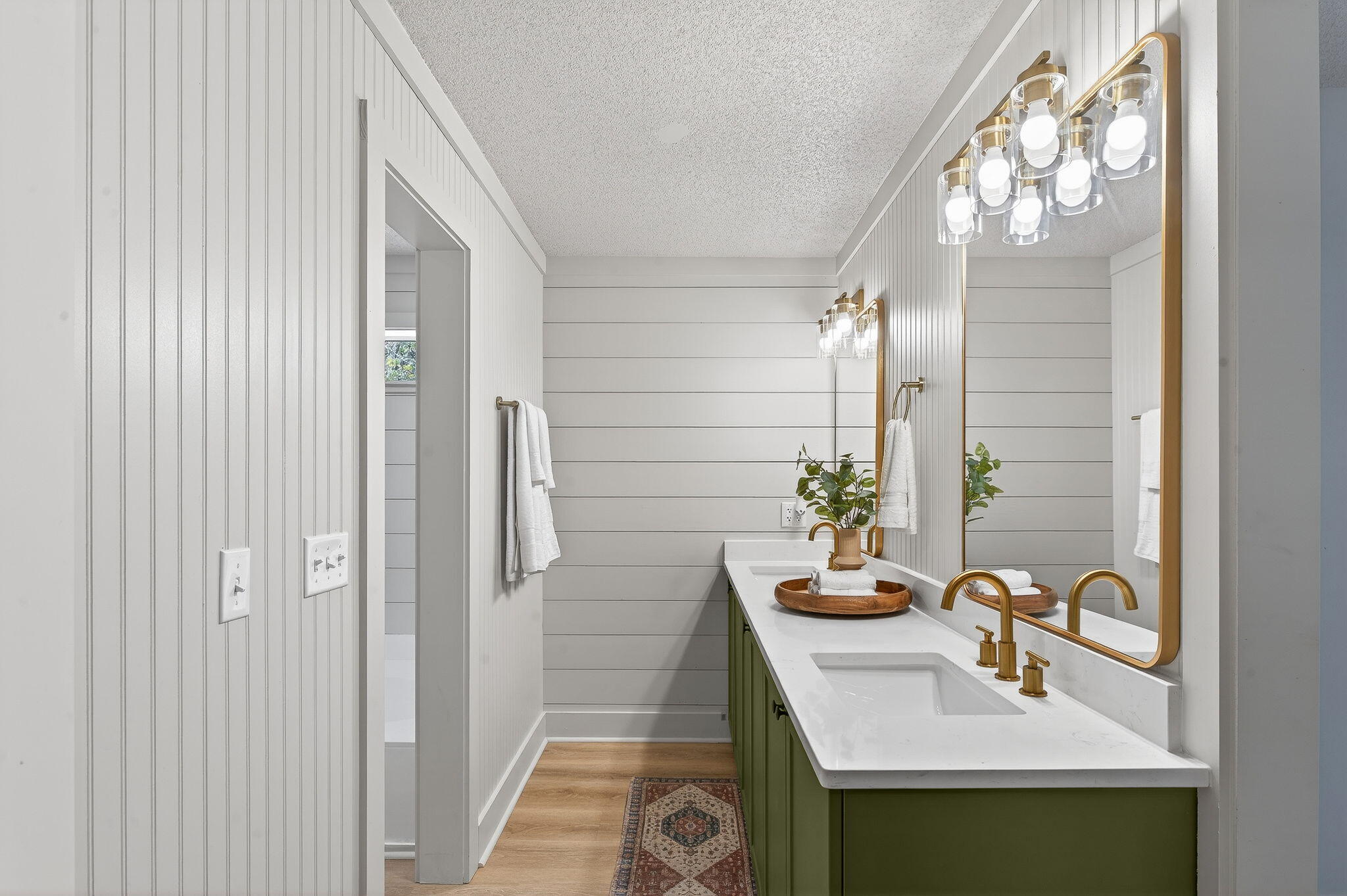 932 Ridgewood Way Niceville, FL 32578 - Photo 29 of 47 a bathroom with a sink and a mirror