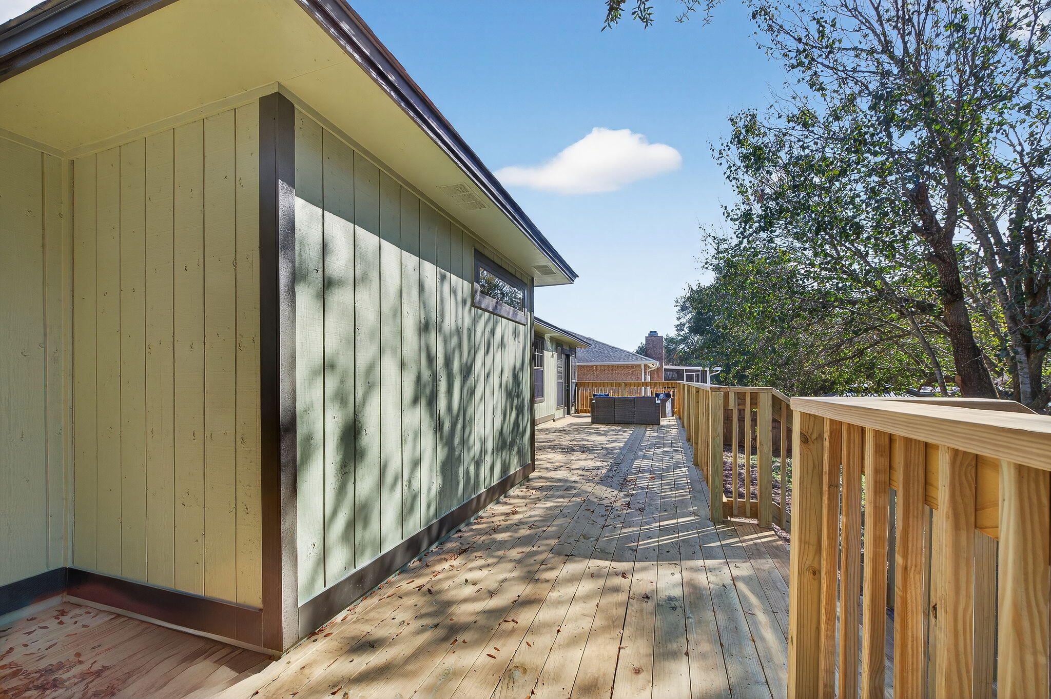 932 Ridgewood Way Niceville, FL 32578 - Photo 44 of 47 a view of balcony with wooden floor and fence