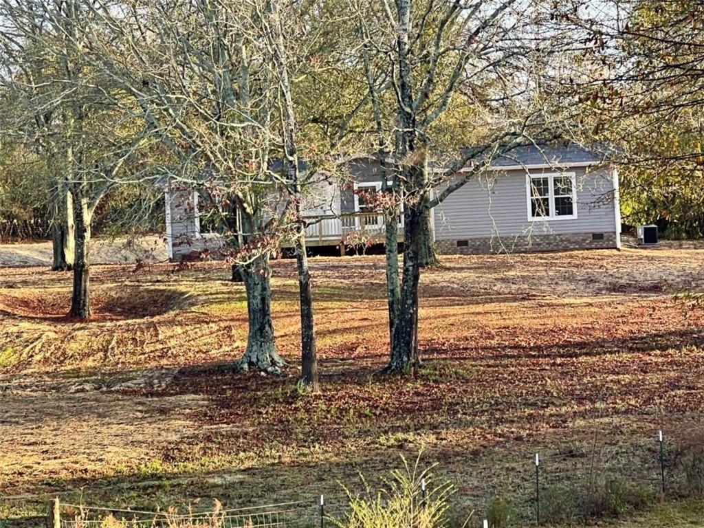 5041 Young Road Gainesville, GA 30506 - Photo 2 of 18 a view of a backyard of the house