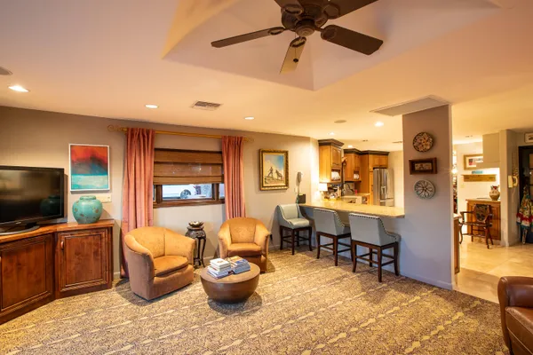 a living room with furniture and a window
