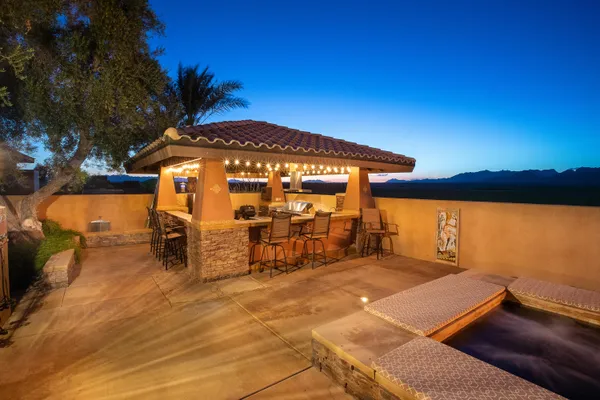 a view of a swimming pool with a patio