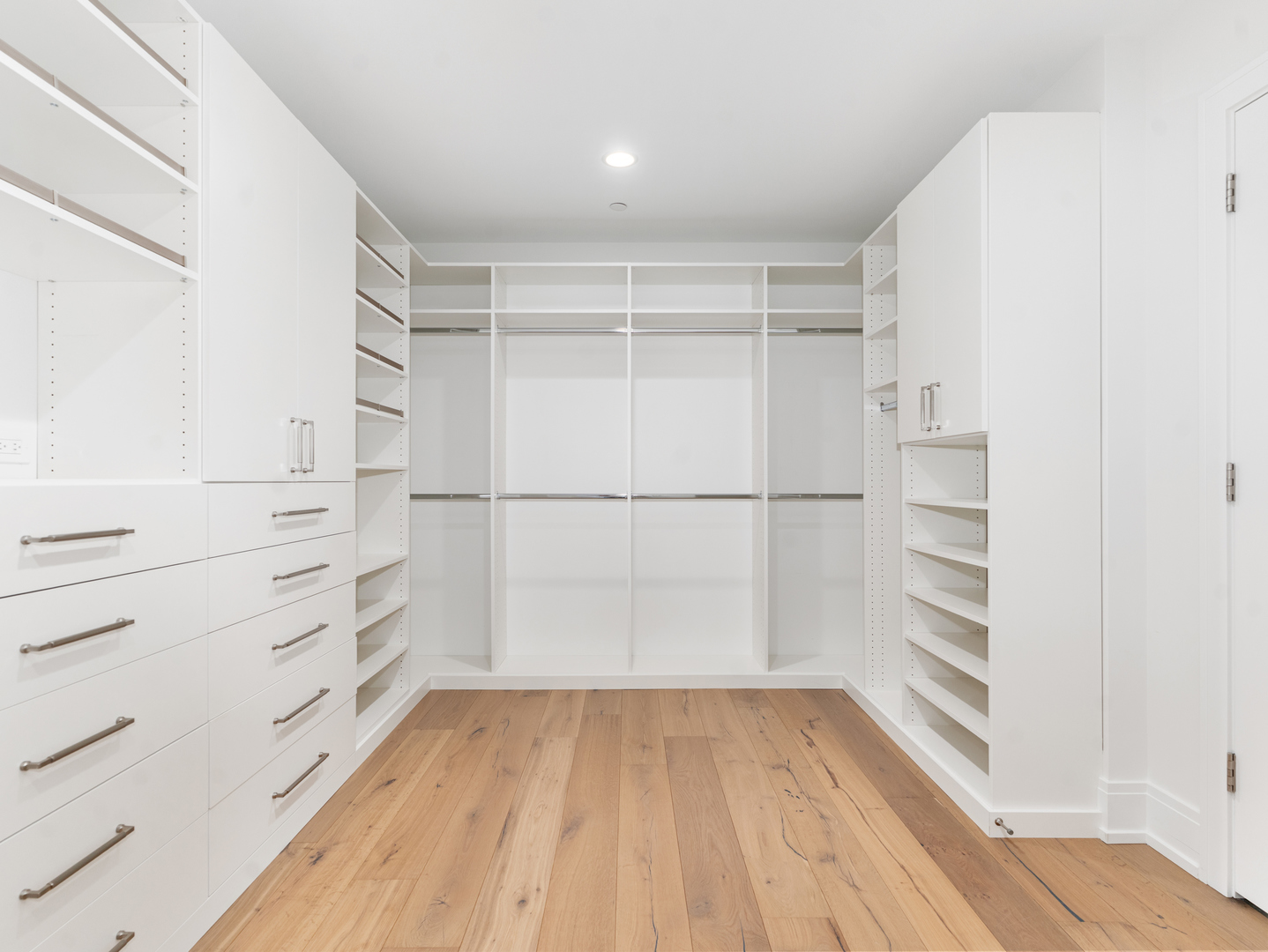 110 South Washington Street, Unit 400 Naperville, IL 60540 - Photo 33 of 54 a view of walk in closet with empty racks