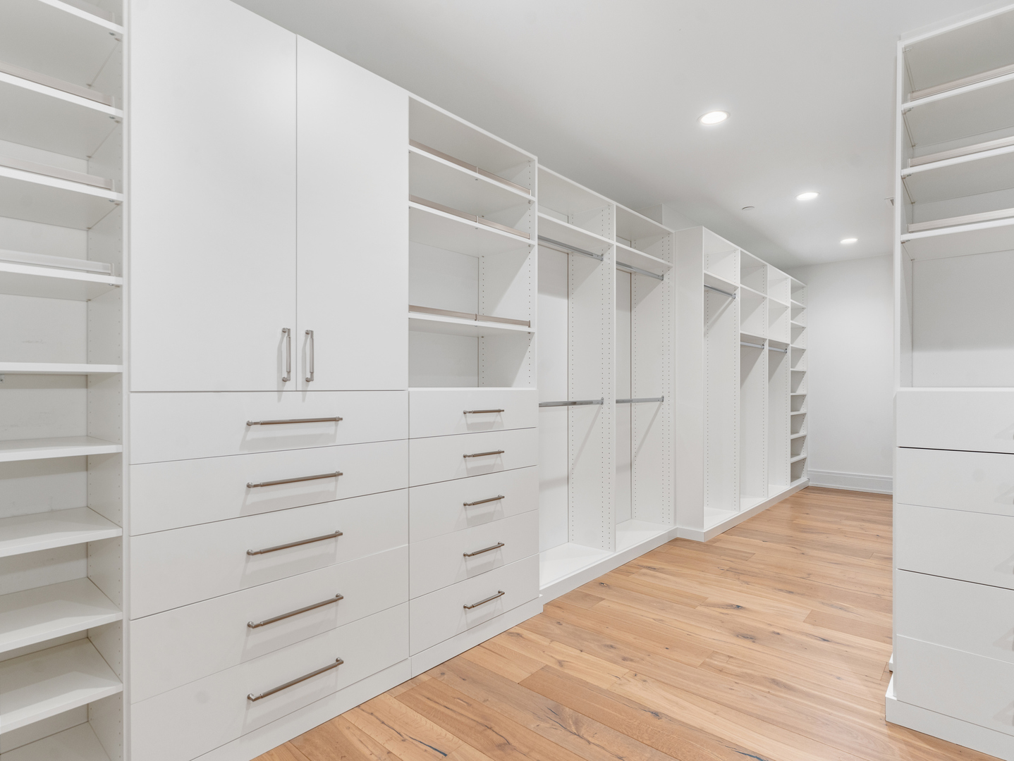 110 South Washington Street, Unit 400 Naperville, IL 60540 - Photo 35 of 54 a view of walk in closet with empty racks