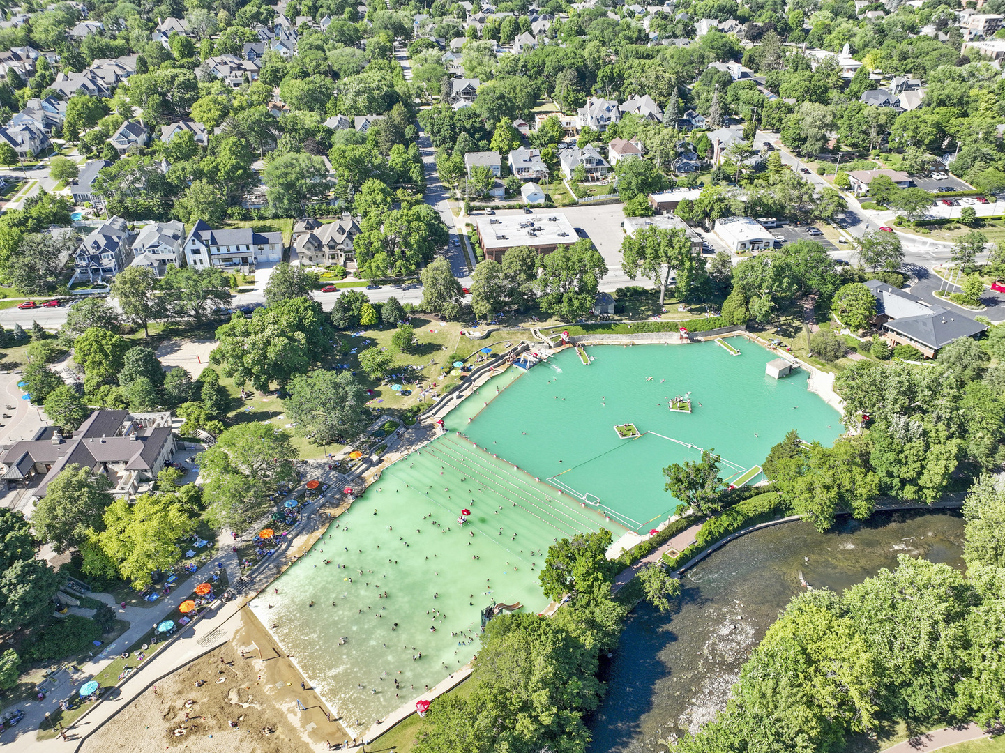 110 South Washington Street, Unit 400 Naperville, IL 60540 - Photo 50 of 54 an aerial view of a residential houses with outdoor space and a lake view
