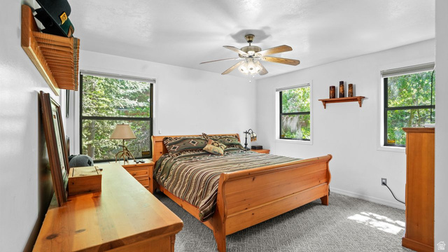 335 Jungfrau Hill Road Midway, UT 84049 - Photo 22 of 34 Carpeted bedroom featuring baseboards and a ceiling fan
